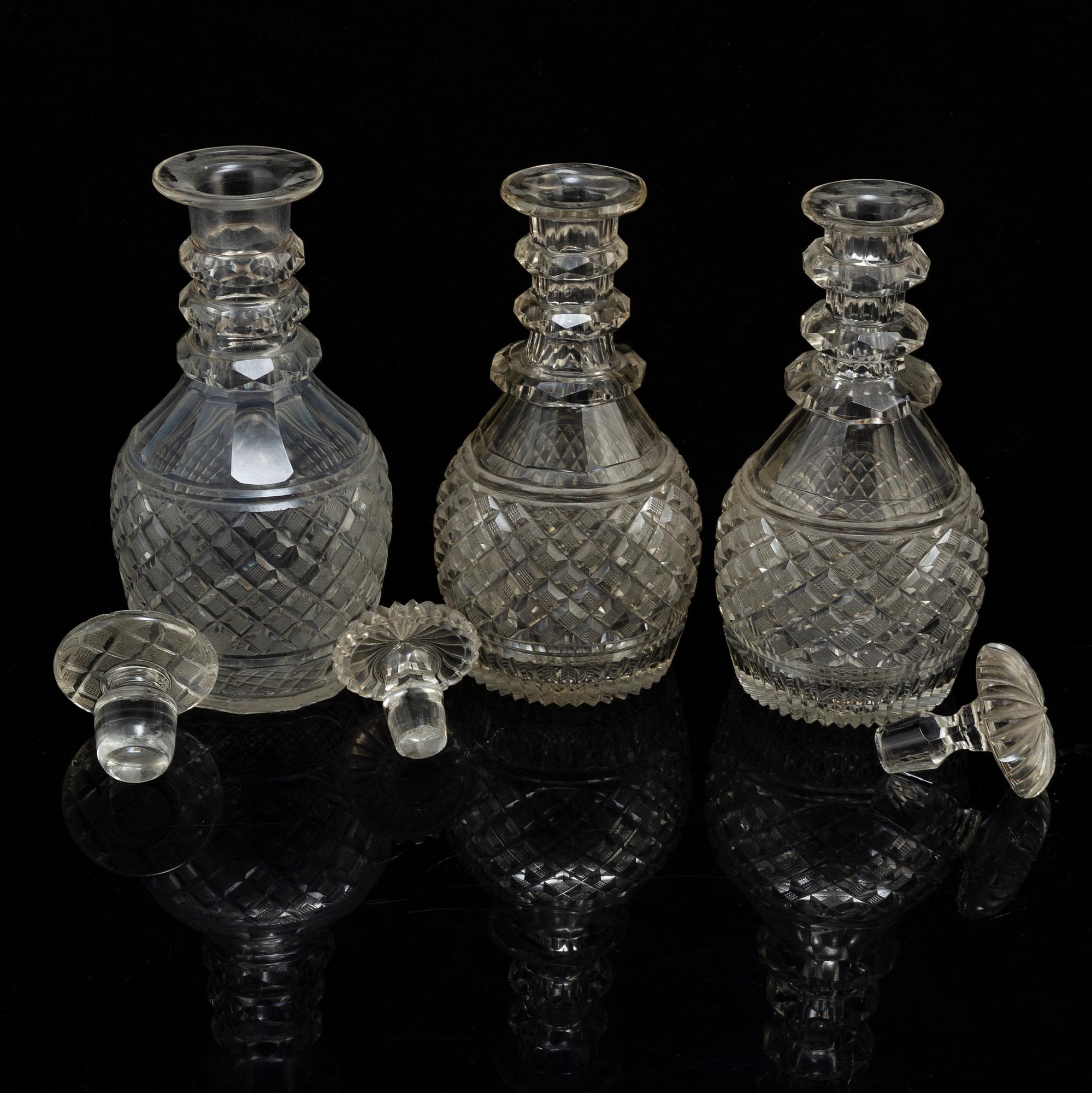 Three late 19th century glass decanters.
