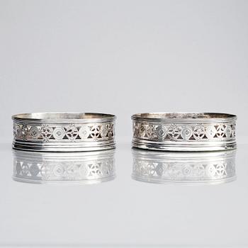 An English late 18th century pair of silver coasters, mark of John Robertson & David Darling, Newcastle 1795.