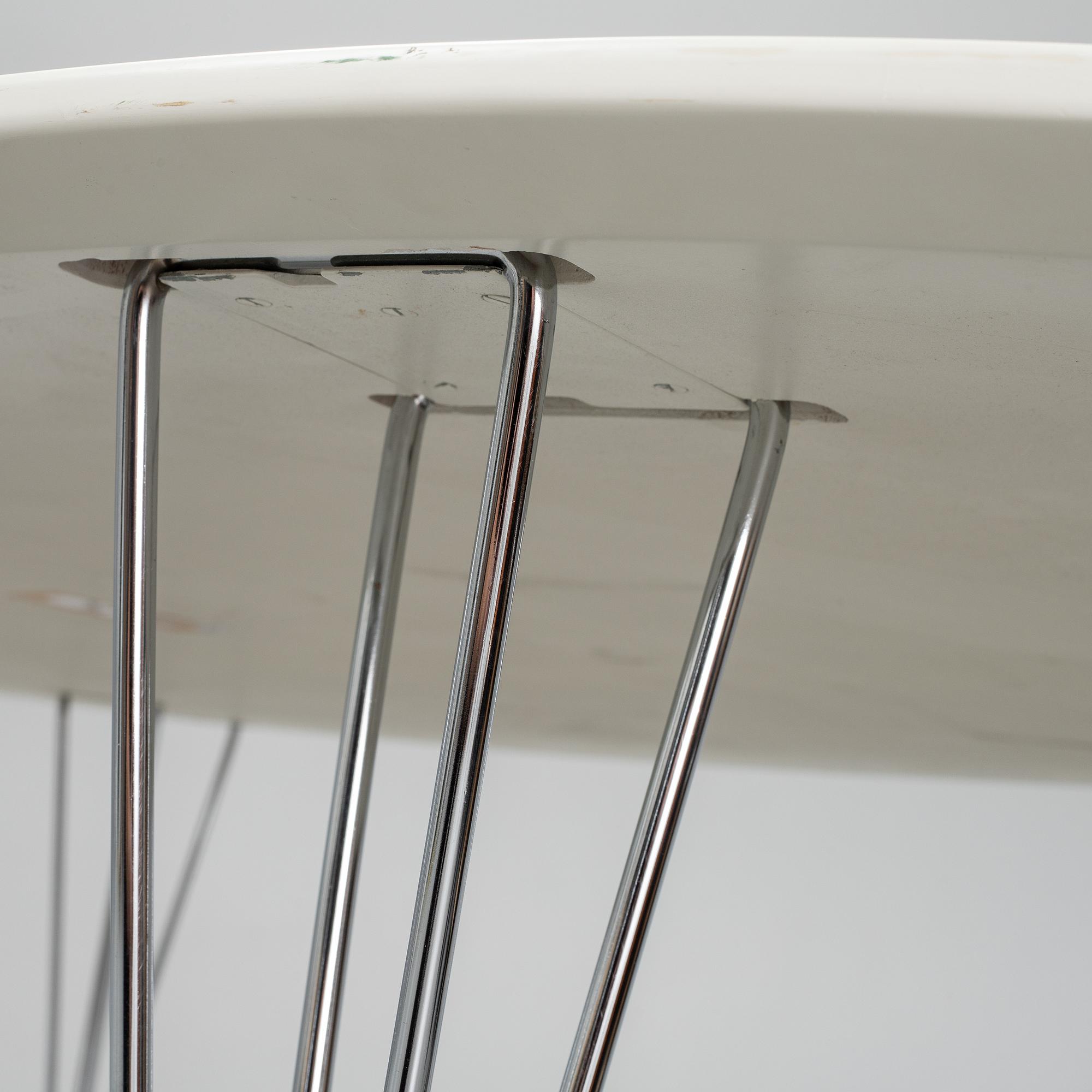 A 'Superellips' table by Piet Hein & Bruno Mathsson by Mathsson International, Värnamo.