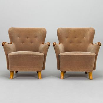 A pair of 1950's armchairs.