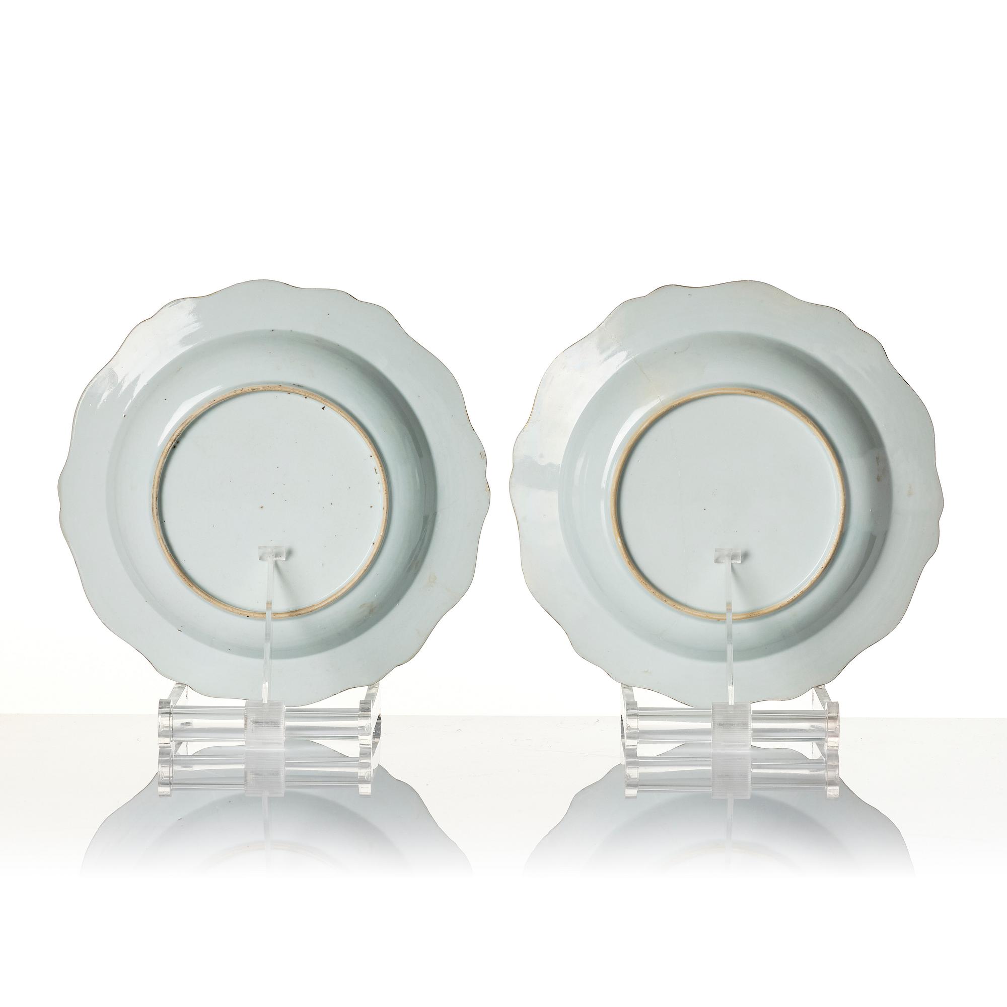 A pair of Chinese famille rose armorial plates, Qing dynasty, Qianlong (1736-95).