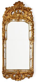 980. A Swedish Rococo mirror.