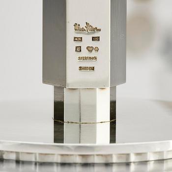 Wiwen Nilsson, a pair of sterling silver candlesticks, Lund, Sweden 11957 and 1960.