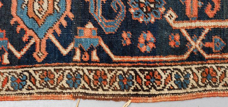 A carpet, an antique Heriz, ca 469,5-471 x 300-309,5 cm.