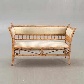 A set of sofa, table and armchairs, bamboo, first part of the 20th century.