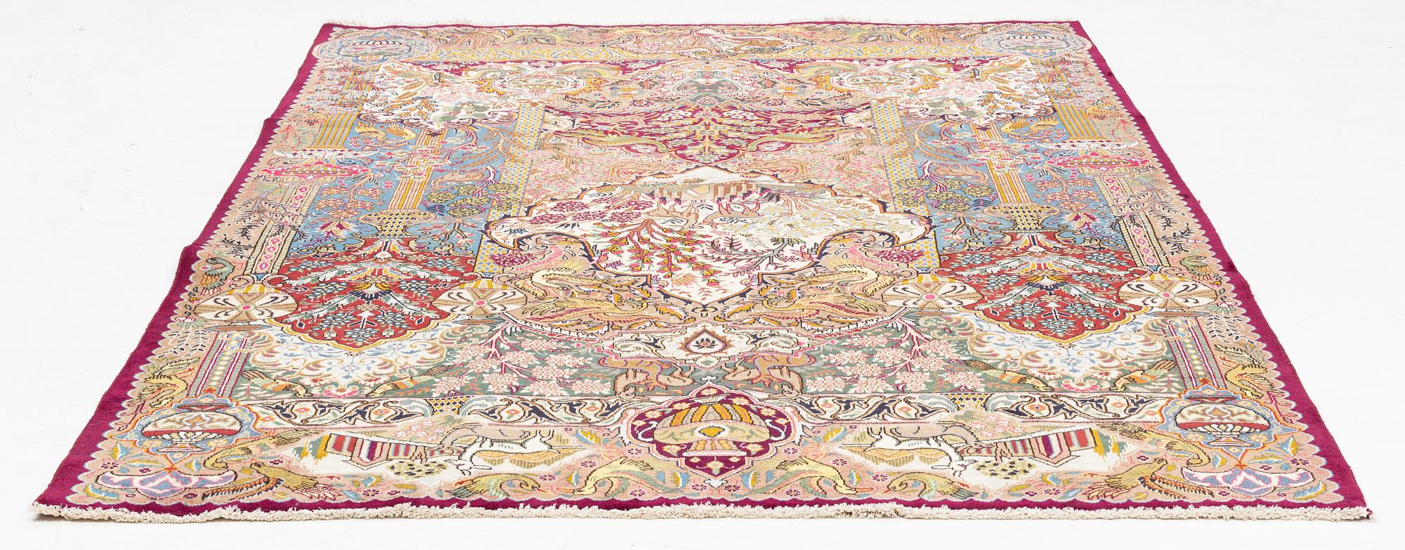 A Kashmar carpet, ca 295 x 202 cm.