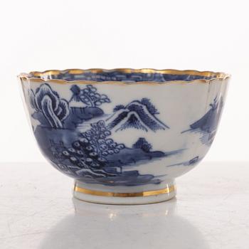 A group  of three serving dishes, a serving bowl, a cup, and seven plates, porcelain, including China 18th century.