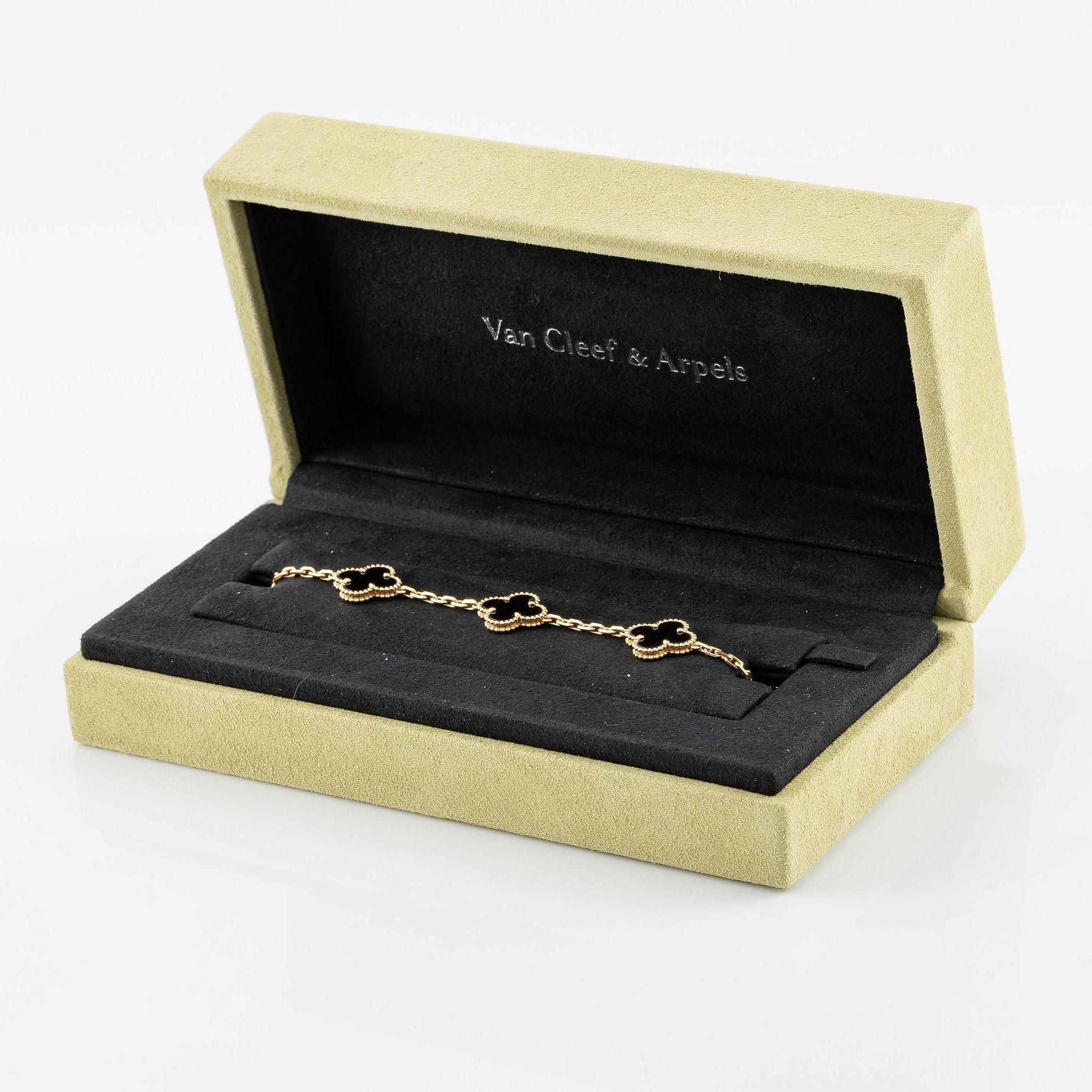 A Van Cleef & Arpels bracelet "Alhambra" 18K gold with onyx.