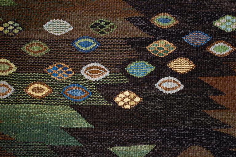 Barbro Nilsson, a carpet, "Tånga brun och grön", flat weave, ca 223 x 153-155 cm, signed AB MMF BN.