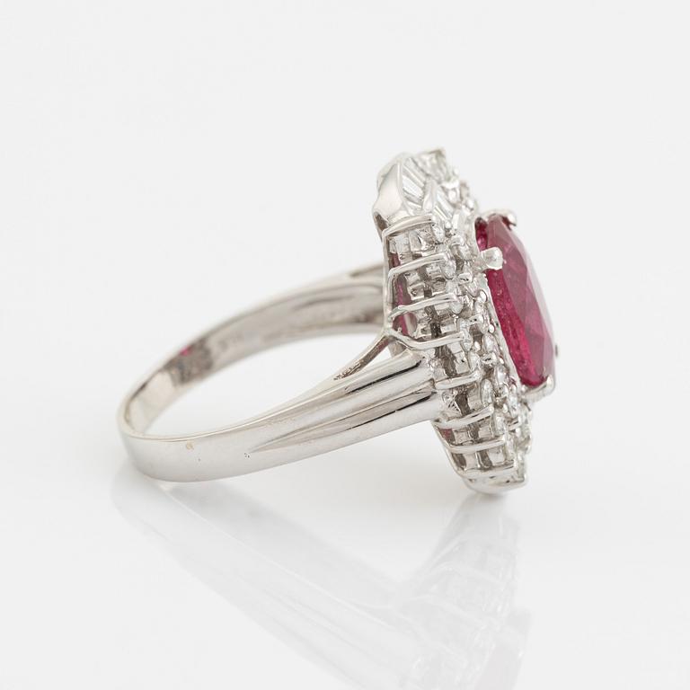 Ruby, baguette- and brilliant cut diamond ring.