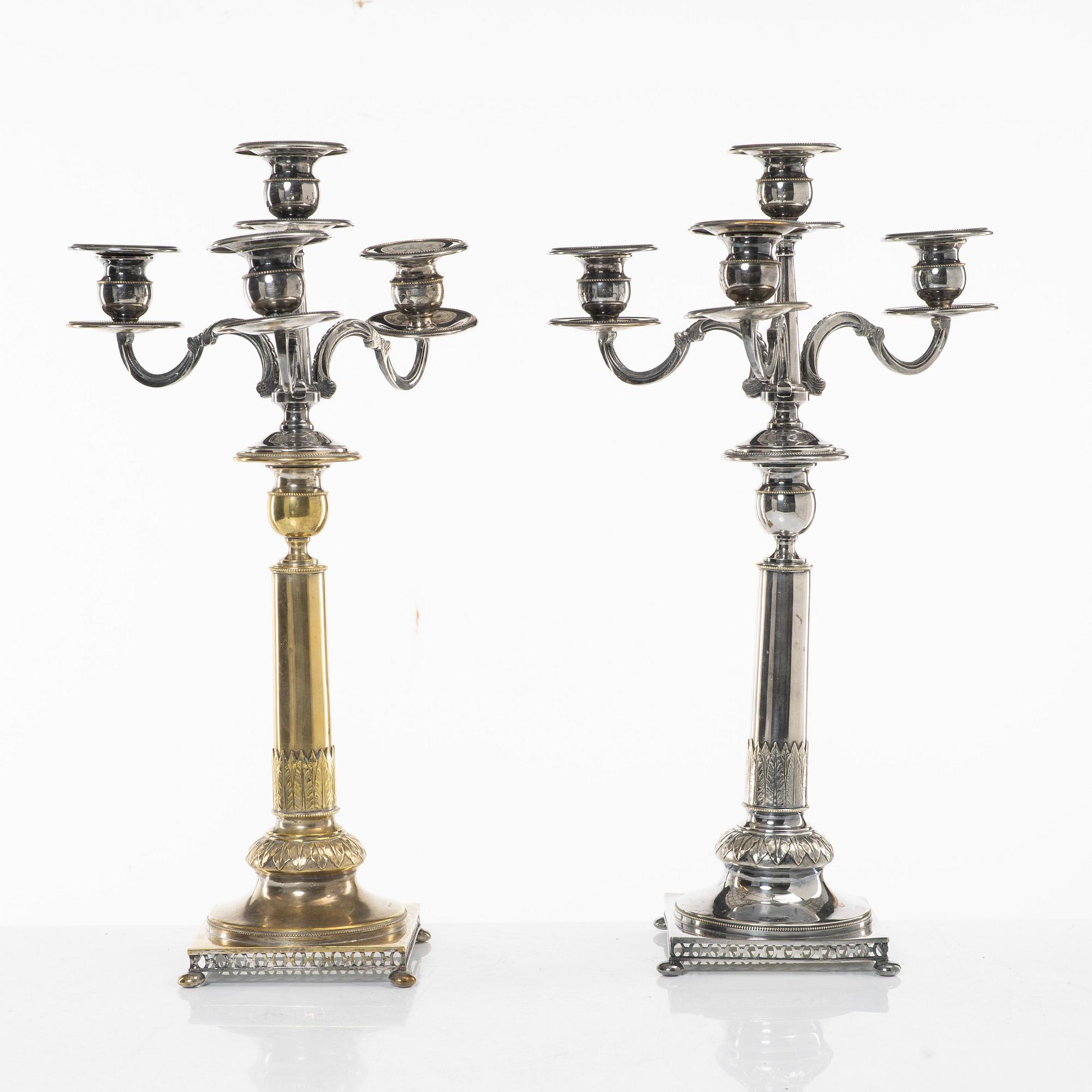 A pair of silver plated candelabra, CG Hallbergs Guldsmeds Ab, Stockholm, first half of the 20th century.