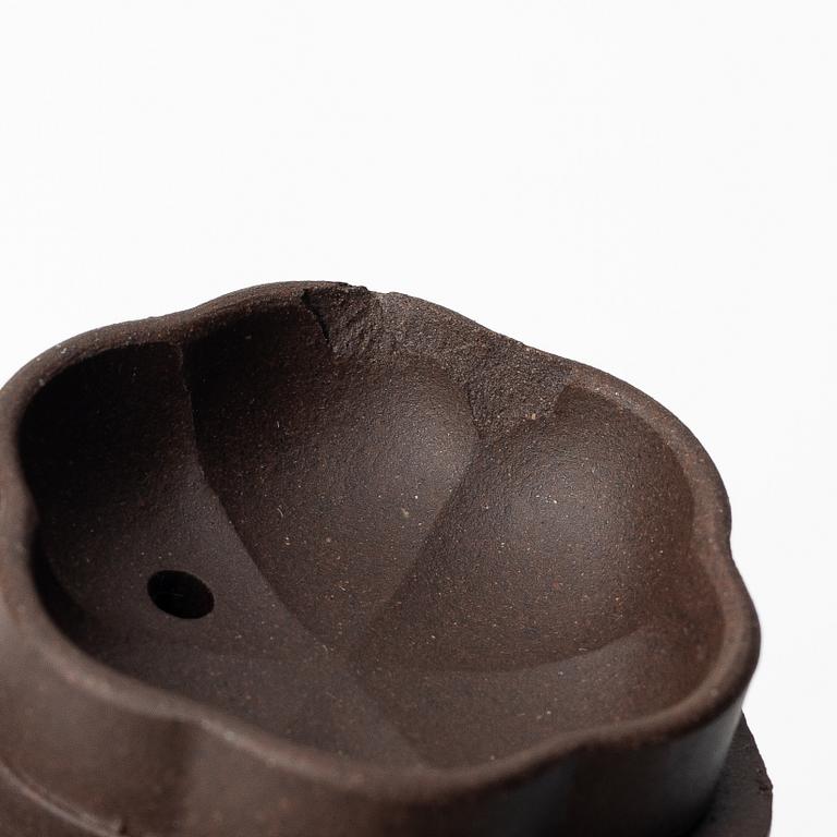 Two similar 'magnolia flower six-petal' yixing teapots, China, 1980s.