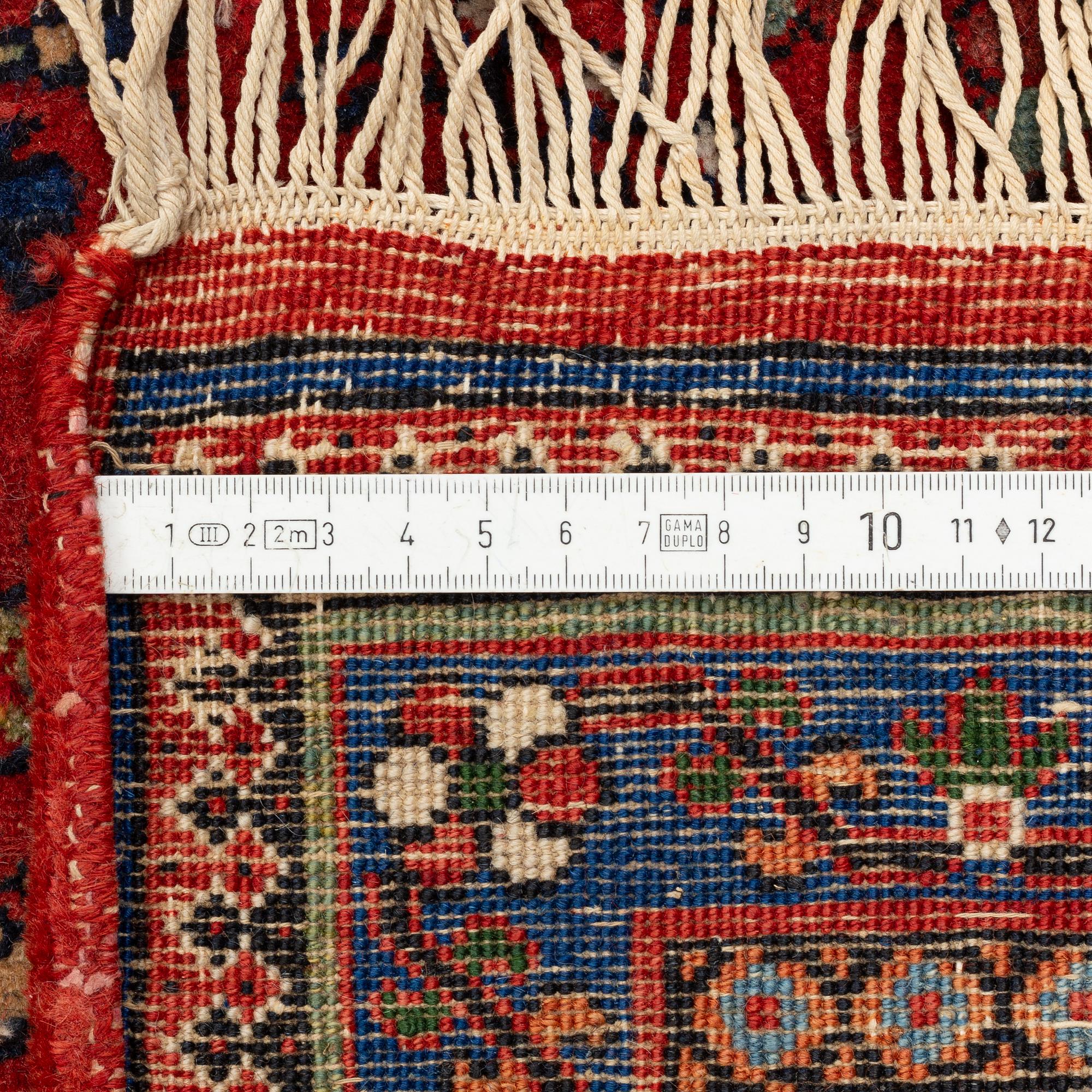 A carpet, possibly Bakhtiari, ca 309 x 230 cm.