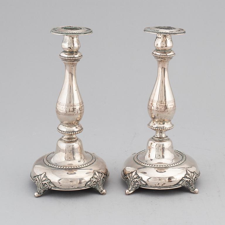 A pair of silver candlesticks, circa 1900.