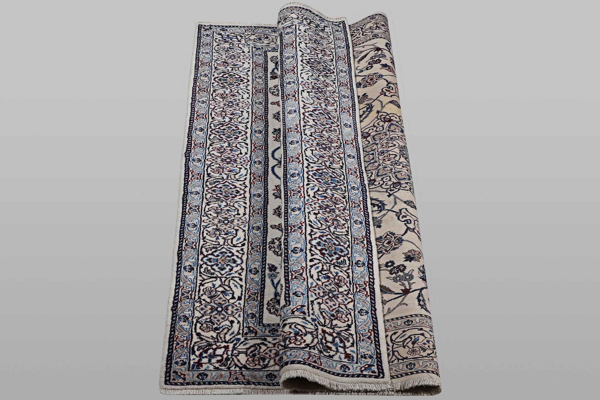 A carpet, Nain, part silk, 9 laa, ca 290 x 196 cm.