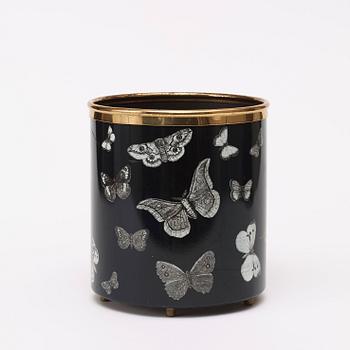 A Piero Fornasetti waste paper bin, Milan, Italy.