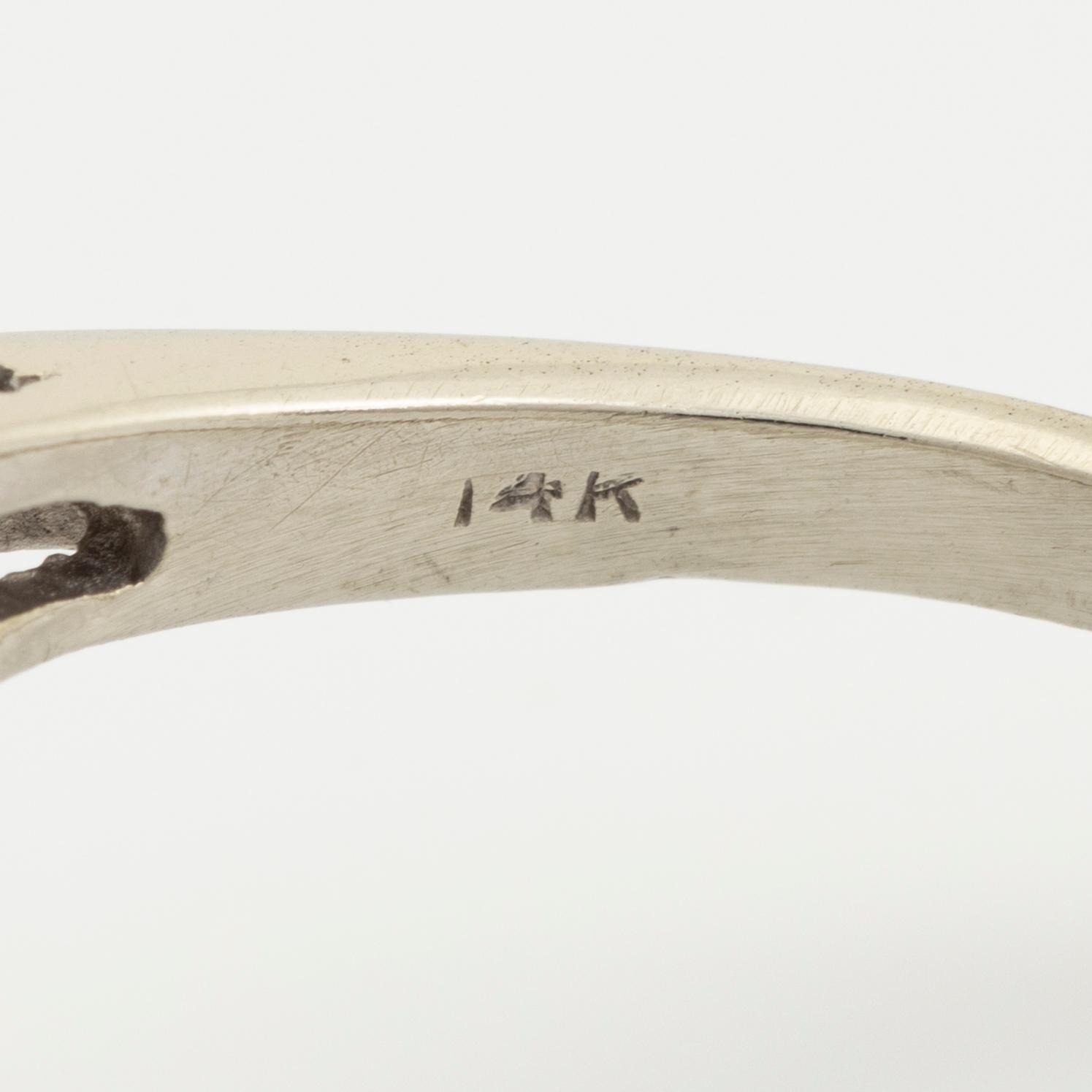 A 14K gold ring set with diamonds.