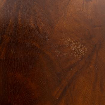 A 1940s mahogany coffee table.