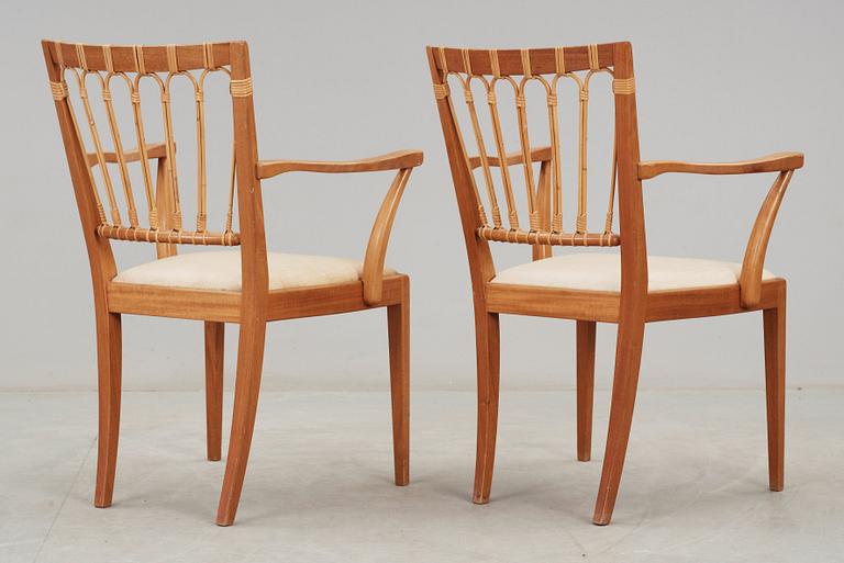 A pair of Josef Frank mahogany chairs, Svenskt Tenn, model 1165.