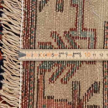 A Heriz rug, c. 192 x 133-139 cm.