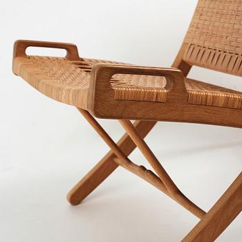 Hans J. Wegner, a pair oak and rattan "model 512" folding chairs by Johannes Hansen, Denmark 1950-60's.