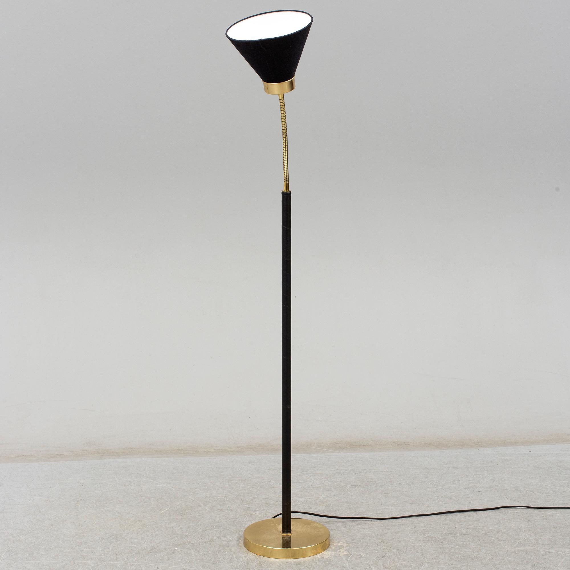 JOSEF FRANK, a brass and leather wrapped floor lamp, model 1838, from Firma Svenskt Tenn.