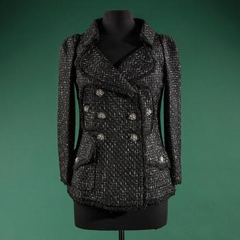 A jacket by CHANEL, in size 40(FR).