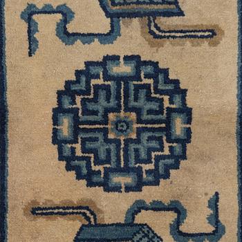 Two antique Chinese Pao-Tow rugs, c. 125 x 65 and 125 x 60 cm.