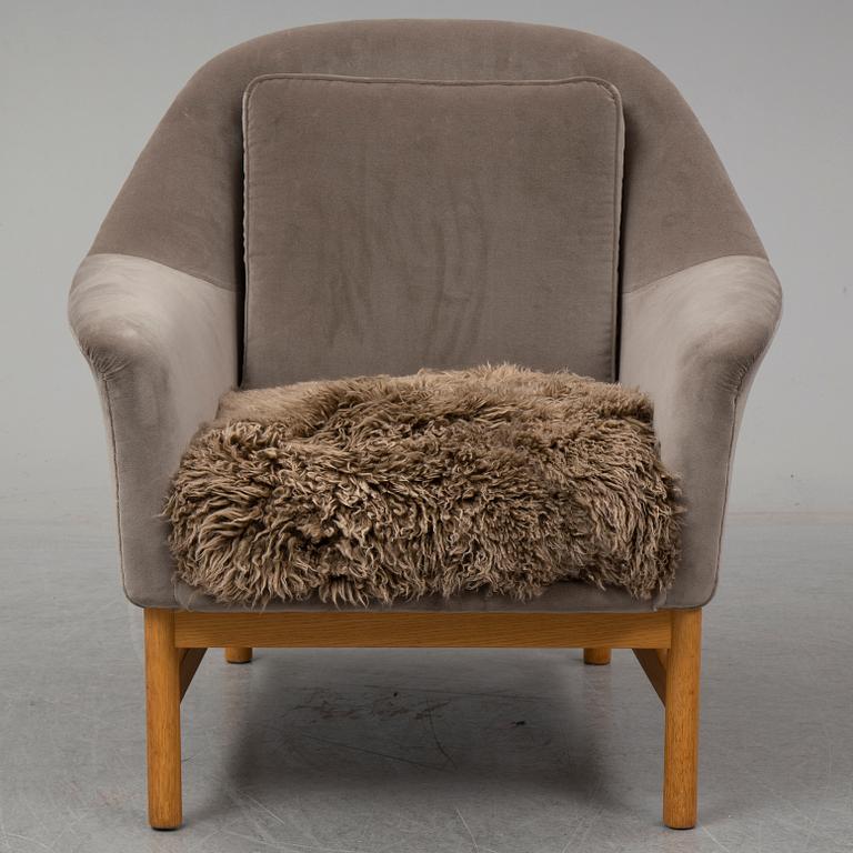 KERSTIN HÖRLIN-HOLMQUIST, a 'Napoleon' easy chair, Nyköping, Nordiska Kompaniet, mid 20th century.