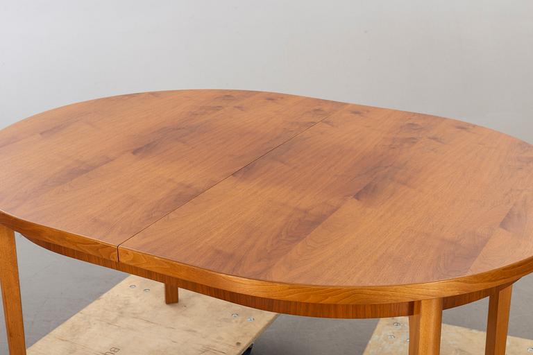 A second half of the 20th century walnut dining table.