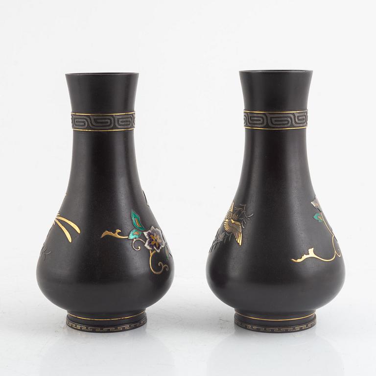 A pair of bronze vases with enamel decoration, first part of the 20th century.