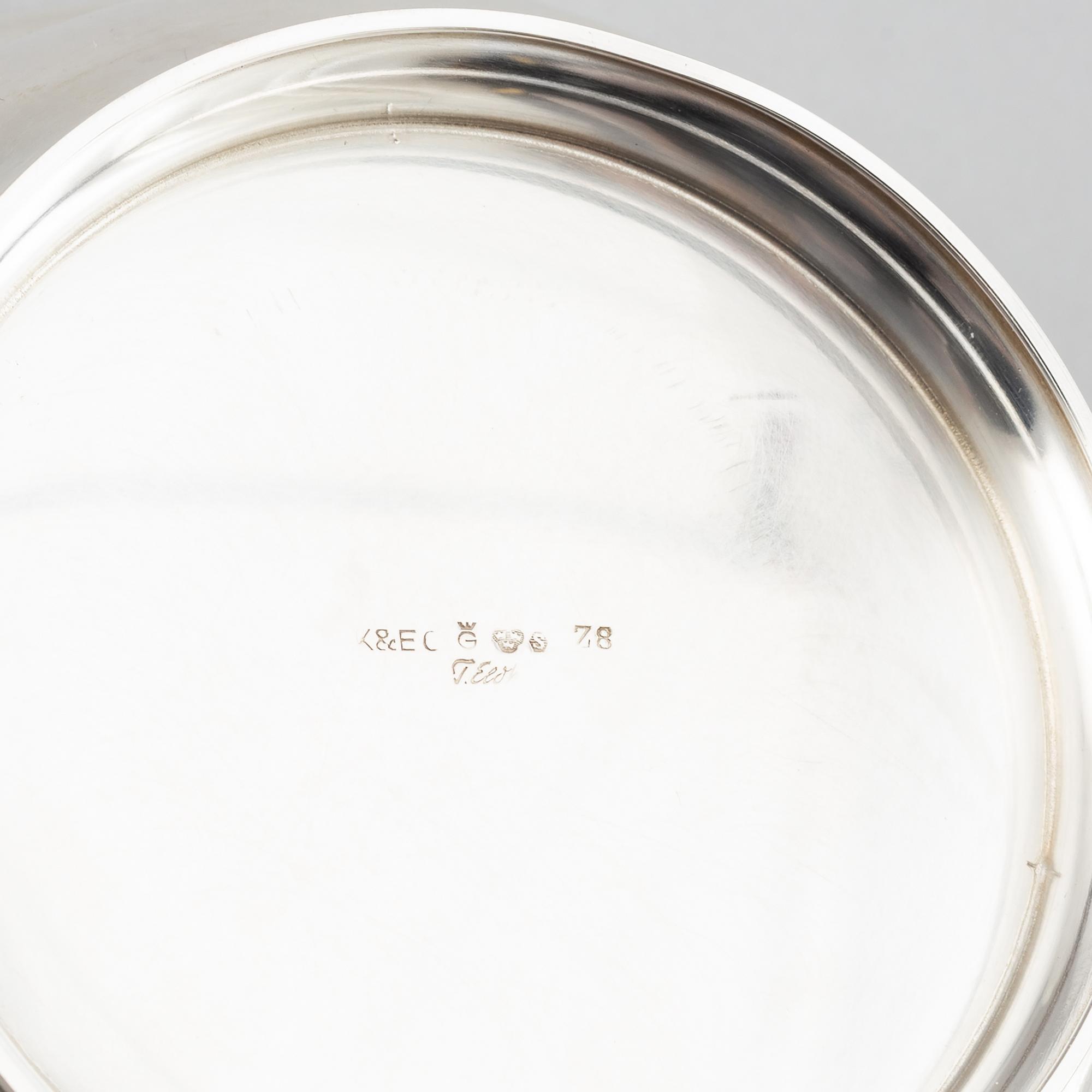 Tore Eldh, a silver bowl, decorated with a border of leafy sprigs, Gothengurg, Sweden, 1950.