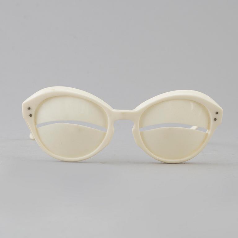 André Courrèges, a pair of 'Eskimo Eclipse' sunglasses, designed in 1965.