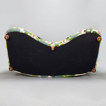 A model 968 sofa by Josef Frank for Firma Svenskt Tenn.