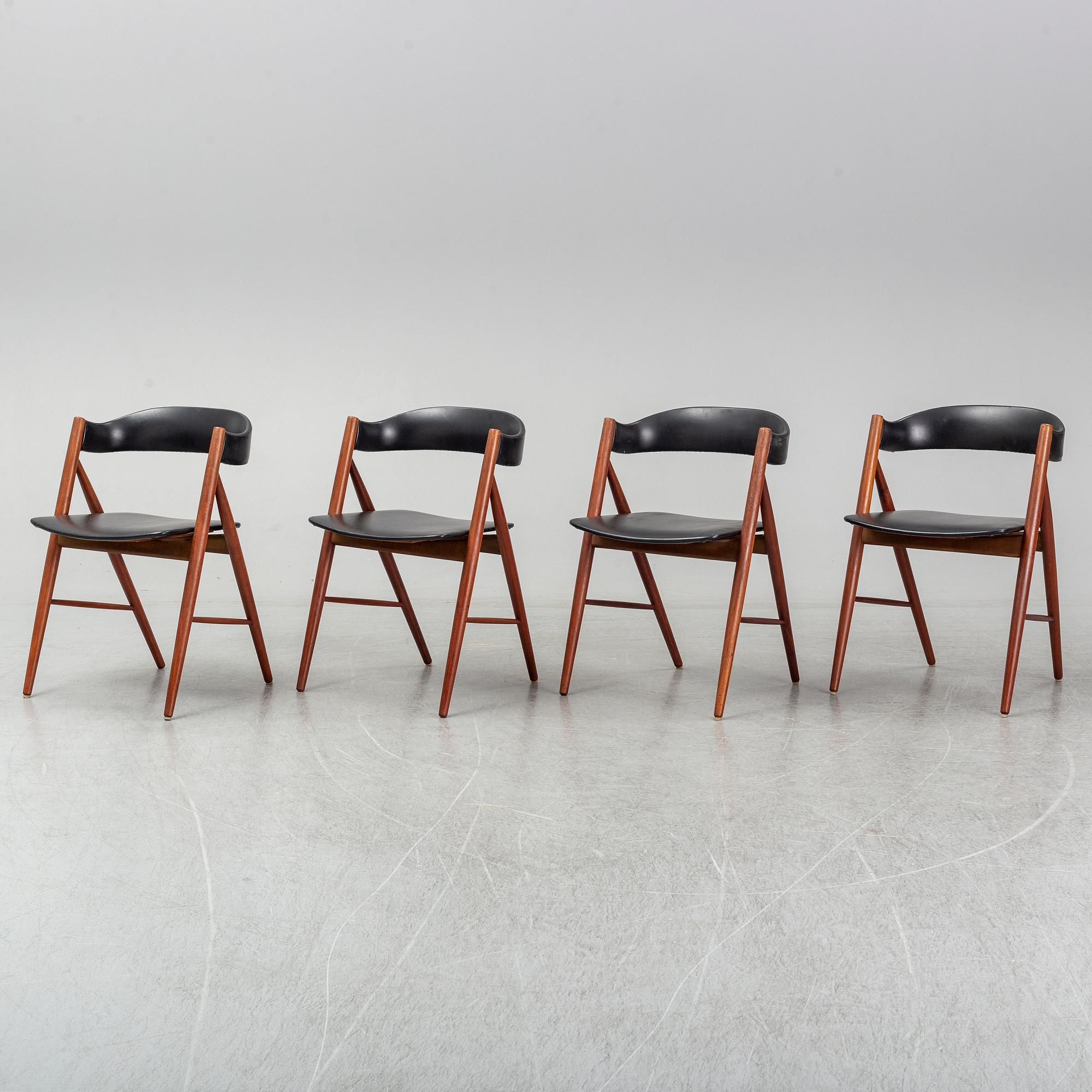 Four 1960s teak chairs.