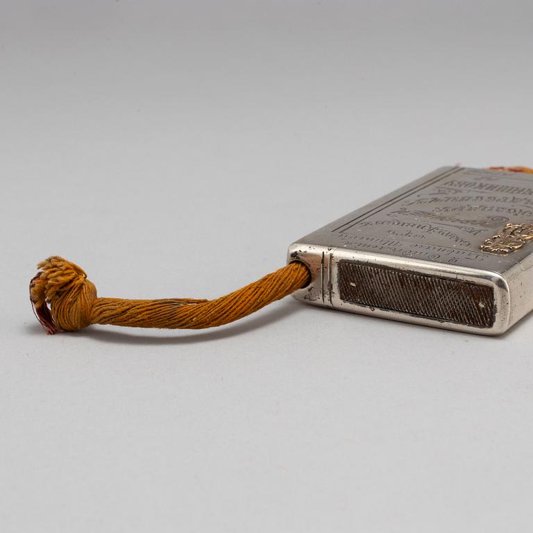 A Russian late 19th century parcel-gilt silver cigarette-case, unidentified makers mark, St. Petersburg.