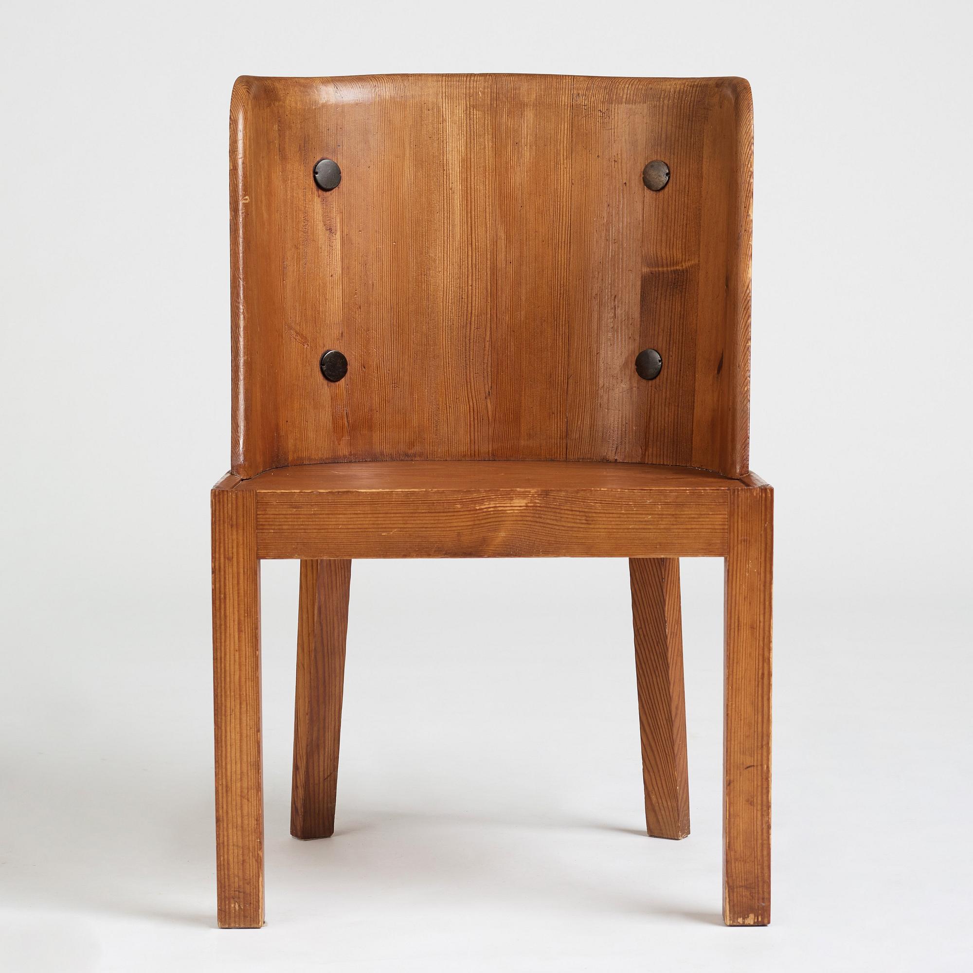 Axel Einar Hjorth, a stained pine low back "Lovö" chair, Nordiska Kompaniet, Sweden 1930's.