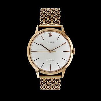 1113. A Rolex gentleman's gold watch, 1960's.