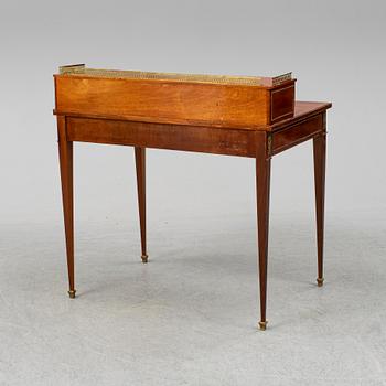 A Louis XVI-style writing desk, 20th ct.