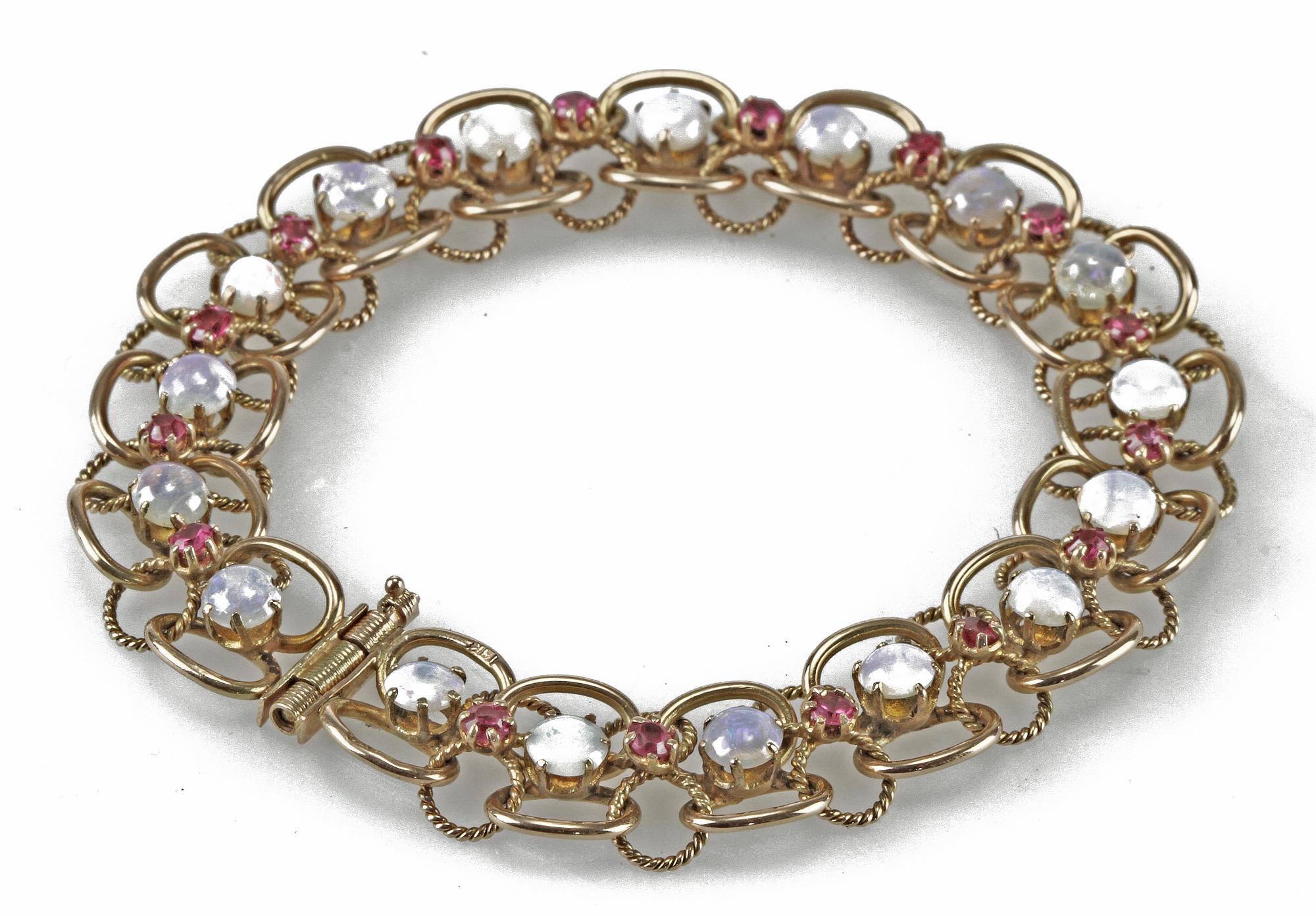 ARMLÄNK, 14 K guld, rubiner samt stenar.