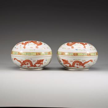 A pair of phoenix and dragon boxes with covers, late Qing dynasty, with Qianlong four character mark.