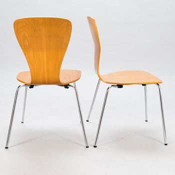 TAPIO WIRKKALA, a set of four mid 20th century 'Nikke' charis for Asko Finland.