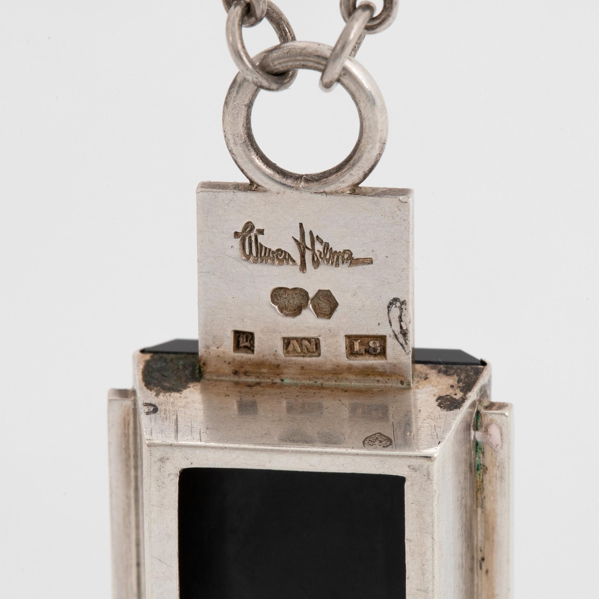 Wiwen Nilsson, hängsmycke, Lund 1937, silver med bergkristall och onyx.