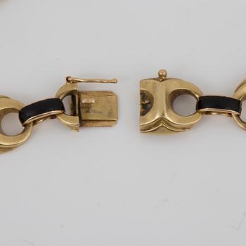 ARMBAND, ankarelänkar med svart emalj dekor, troligen 1800-talets slut, 18K guld.