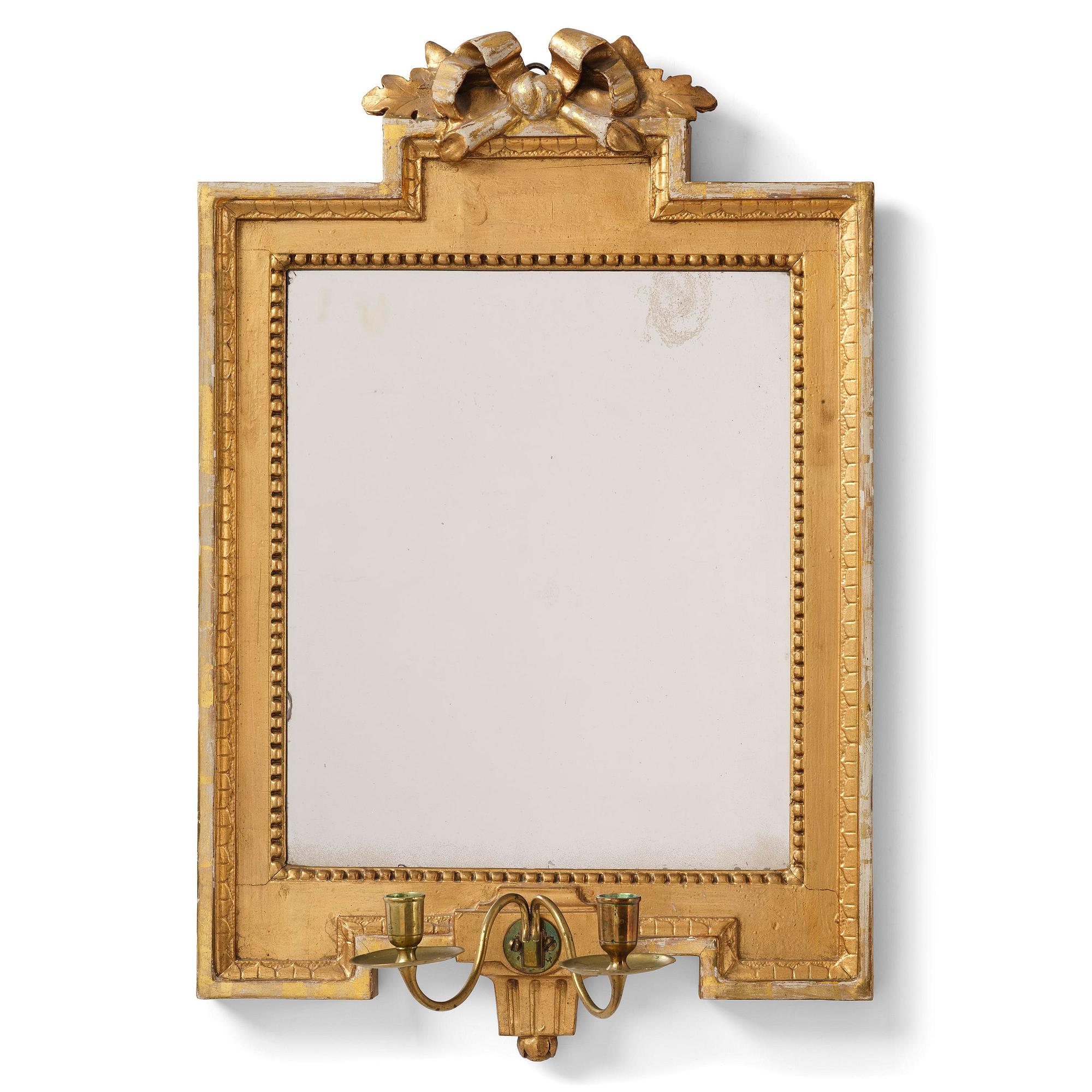 A Gustavian giltwood two-light girandole mirror by J. Åkerblad (master in Stockholm 1754-99).