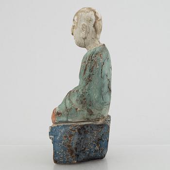 A Louhan, carved and painted wood, China, late Qing dynasty.