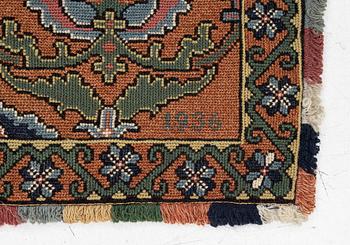 A sleigh cushion, signed BB and dated 1936, c. 160 x 67 cm.