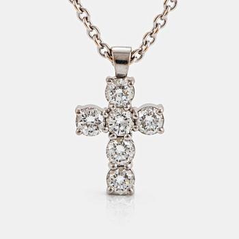 997. An 18K white gold cross pendant set with round brilliant-cut diamonds with a total weight of ca 1.20 cts.