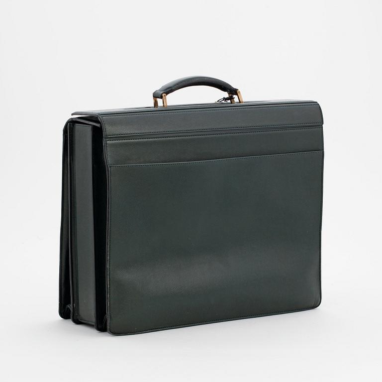 LOUIS VUITTON, a green leather briefcase.