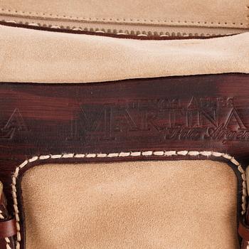 LA MARTINA, a beige suede and brown leather weekend bag.